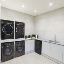 washing machine and dryers are available in the laundry / utility area at Tonnau'r Môr Abersoch